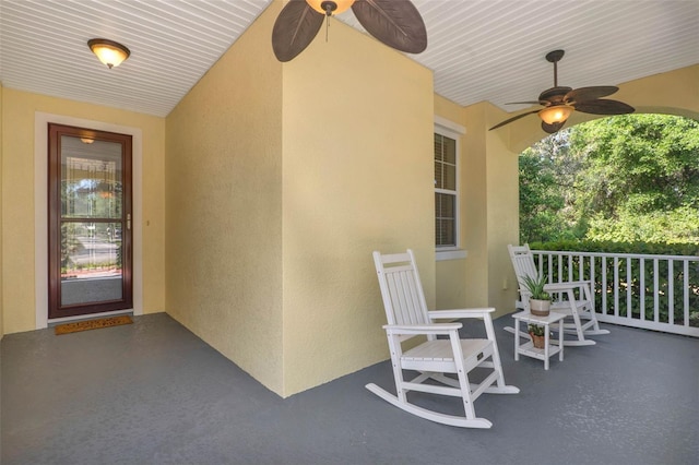 view of patio / terrace with ceiling fan and a porch