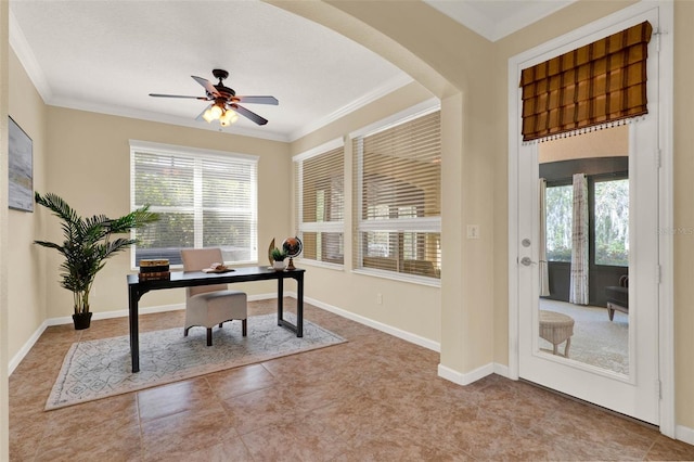 tiled home office featuring a wealth of natural light, baseboards, crown molding, and ceiling fan