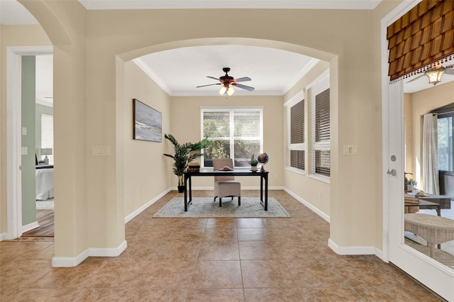 home office featuring a healthy amount of sunlight, ceiling fan, and ornamental molding