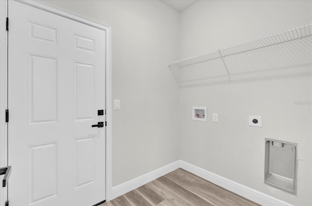 laundry room with electric dryer hookup, baseboards, laundry area, hookup for a washing machine, and light wood finished floors