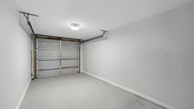 garage with baseboards