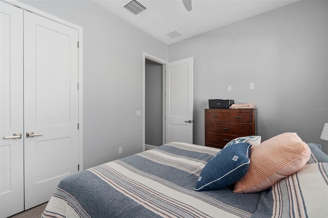 bedroom with visible vents and a ceiling fan