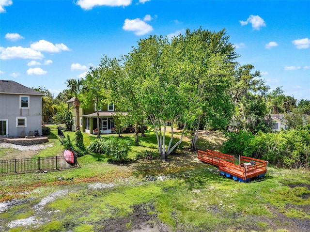 view of yard featuring fence