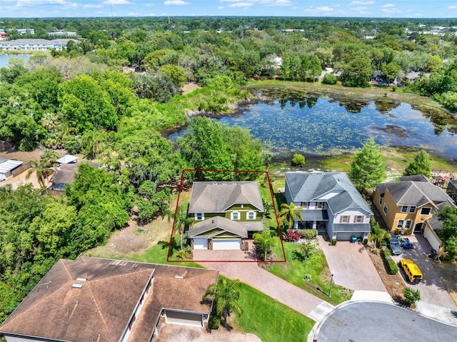 birds eye view of property featuring a water view and a residential view
