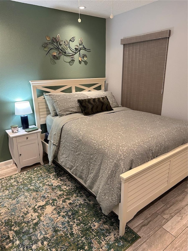 4800 S Semoran Blvd Unit 101, Orlando, FL 32822 - bedroom with wood finished floors