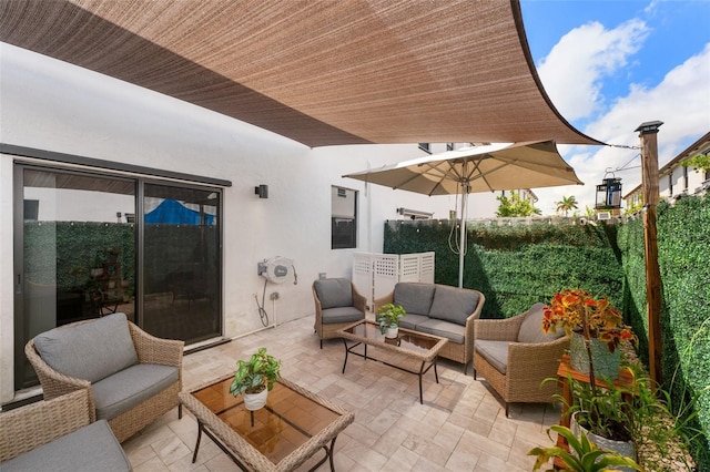 549 NE 206th Ln, Miami, FL 33179 - view of patio / terrace with outdoor lounge area and fence