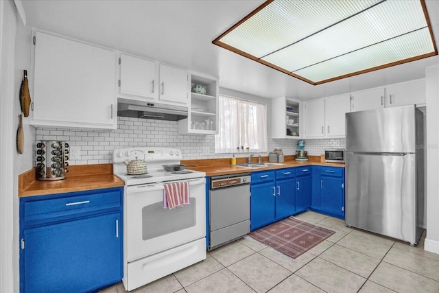 kitchen with freestanding refrigerator, dishwashing machine, open shelves, under cabinet range hood, and electric stove