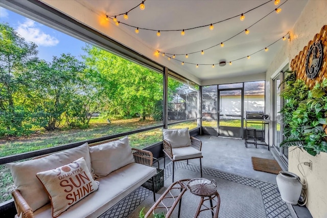 sunroom / solarium featuring an outdoor living space