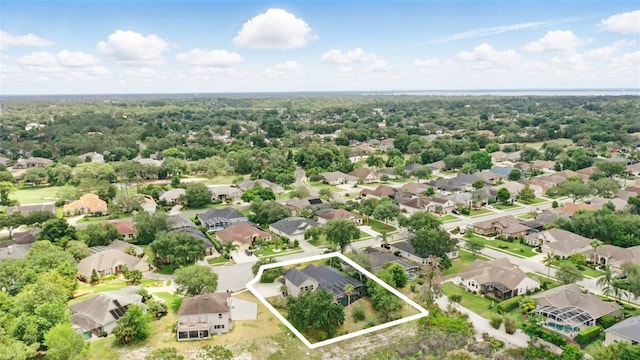 aerial perspective of suburban area featuring property boundaries highlighted