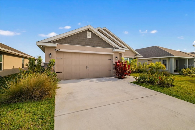 8137 Merano Ave, Fort Pierce, FL 34951 - view of front of property featuring a garage, stucco siding, and driveway