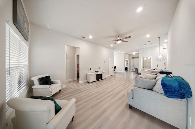 8137 Merano Ave, Fort Pierce, FL 34951 - living area with light wood-style floors, baseboards, a ceiling fan, and recessed lighting