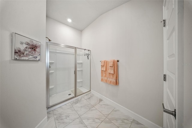 8137 Merano Ave, Fort Pierce, FL 34951 - bathroom with a shower stall, marble finish floor, and baseboards