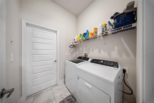 8137 Merano Ave, Fort Pierce, FL 34951 - washroom with washer and dryer, marble finish floor, laundry area, and baseboards