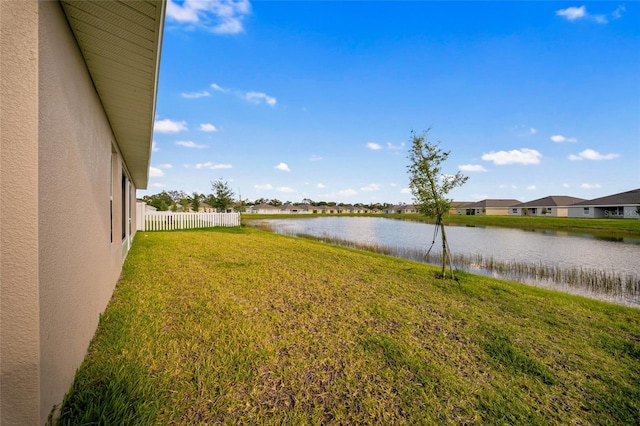 8137 Merano Ave, Fort Pierce, FL 34951 - view of yard featuring fence, a residential view, and a water view