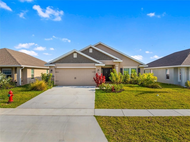 8137 Merano Ave, Fort Pierce, FL 34951 - craftsman house featuring a garage, a front yard, driveway, and stucco siding