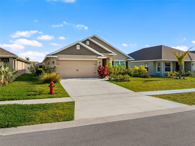 8137 Merano Ave, Fort Pierce, FL 34951 - view of front of property with a garage, stucco siding, driveway, and a front lawn