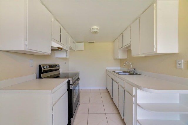 1048 Plantation Dr Unit 12, Kissimmee, FL 34741 - kitchen featuring a sink, light countertops, baseboards, and stainless steel electric range