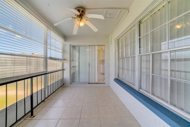 1048 Plantation Dr Unit 12, Kissimmee, FL 34741 - unfurnished sunroom featuring a ceiling fan