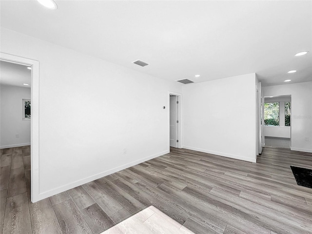 407 Sheryl Dr, Deltona, FL 32738 - unfurnished room with recessed lighting, wood finished floors, and visible vents