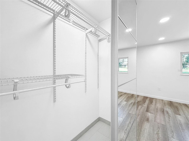 407 Sheryl Dr, Deltona, FL 32738 - spacious closet with light wood-style floors