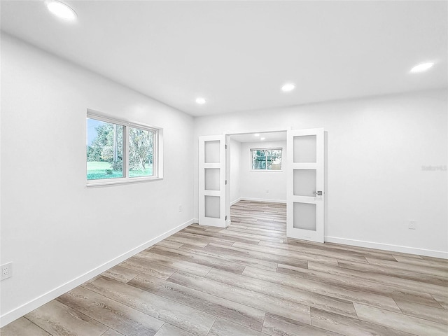407 Sheryl Dr, Deltona, FL 32738 - interior space with light wood-style flooring, baseboards, and recessed lighting