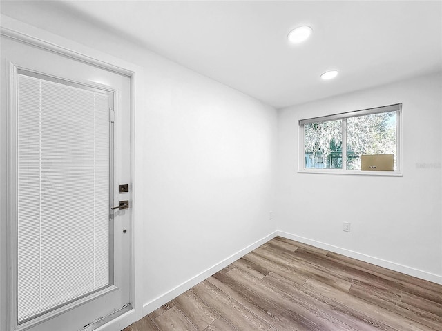 407 Sheryl Dr, Deltona, FL 32738 - unfurnished room with recessed lighting, wood finished floors, and baseboards