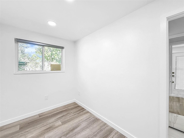 407 Sheryl Dr, Deltona, FL 32738 - empty room with recessed lighting, light wood-style flooring, and baseboards