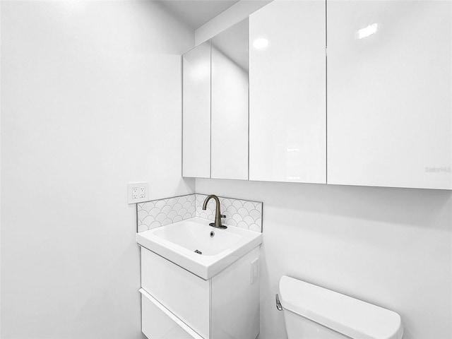 407 Sheryl Dr, Deltona, FL 32738 - half bathroom featuring toilet and vanity