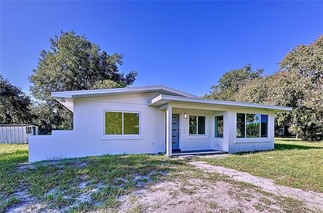 407 Sheryl Dr, Deltona, FL 32738 - view of front of house featuring stucco siding
