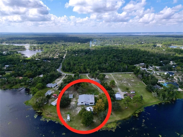 407 Sheryl Dr, Deltona, FL 32738 - birds eye view of property featuring a wooded view and a water view