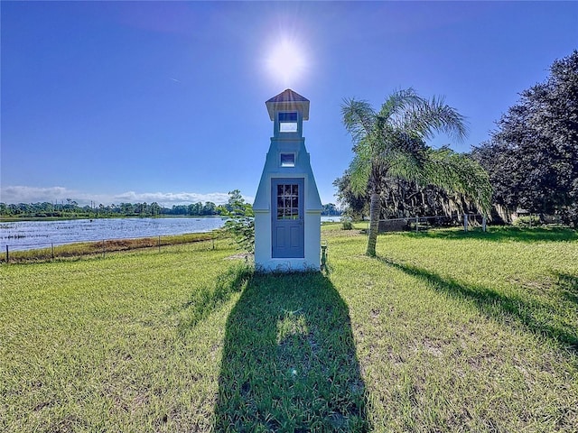 407 Sheryl Dr, Deltona, FL 32738 - surrounding community with a lawn and a water view