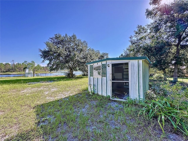 407 Sheryl Dr, Deltona, FL 32738 - view of shed featuring a water view
