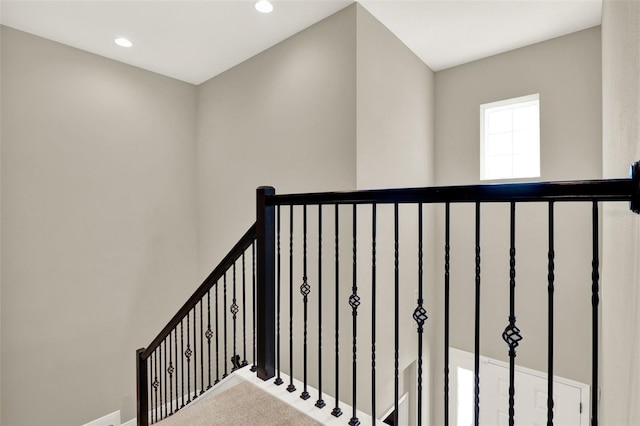 stairway featuring carpet floors and recessed lighting