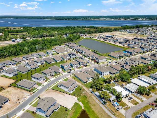 aerial view featuring a water view and a residential view