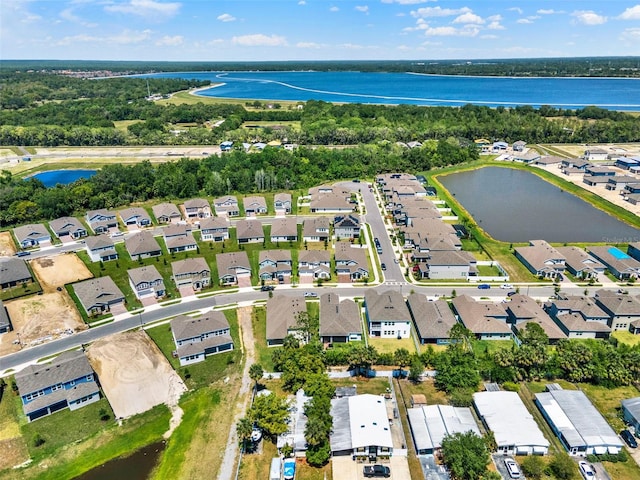 aerial view featuring a residential view and a water view