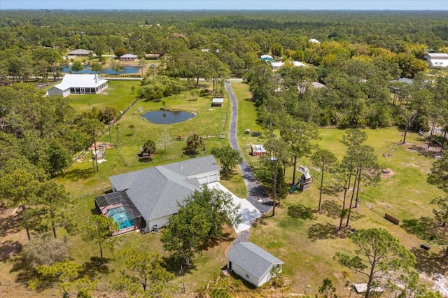 4556 Serna Ave, Malabar, FL 32950 - drone / aerial view of a forest and a nearby body of water