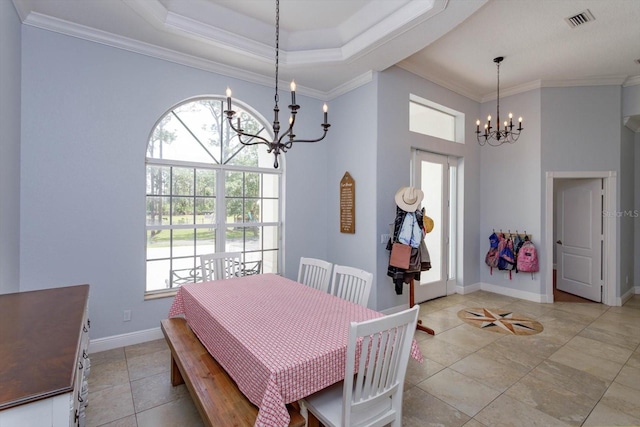 4556 Serna Ave, Malabar, FL 32950 - dining area with a chandelier, a high ceiling, ornamental molding, and a raised ceiling