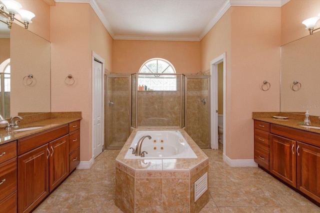 4556 Serna Ave, Malabar, FL 32950 - bathroom with a stall shower, a jetted tub, ornamental molding, two vanities, and tile patterned flooring