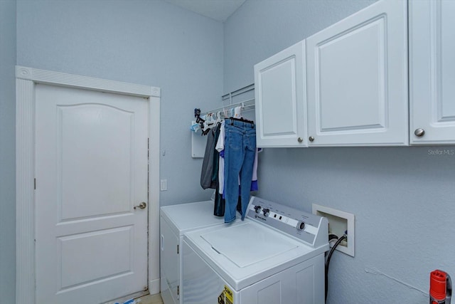 4556 Serna Ave, Malabar, FL 32950 - laundry room with cabinet space and separate washer and dryer