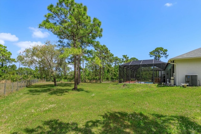 4556 Serna Ave, Malabar, FL 32950 - view of yard featuring a lanai