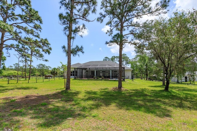 4556 Serna Ave, Malabar, FL 32950 - view of yard with a lanai