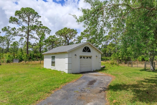 4556 Serna Ave, Malabar, FL 32950 - detached garage featuring driveway