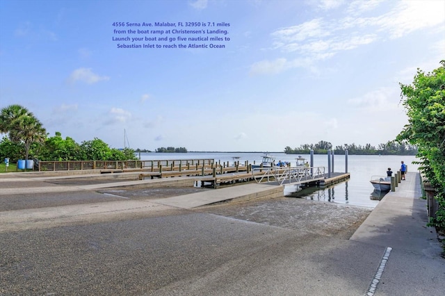 4556 Serna Ave, Malabar, FL 32950 - dock area featuring a boat ramp and a water view
