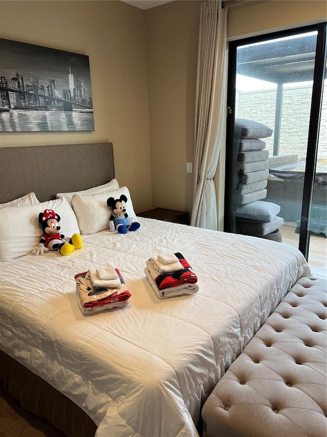 bedroom with access to outside