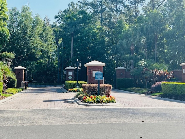 702 Palenci Ct, Winter Springs, FL 32708 - view of road with a gated entry and a gate