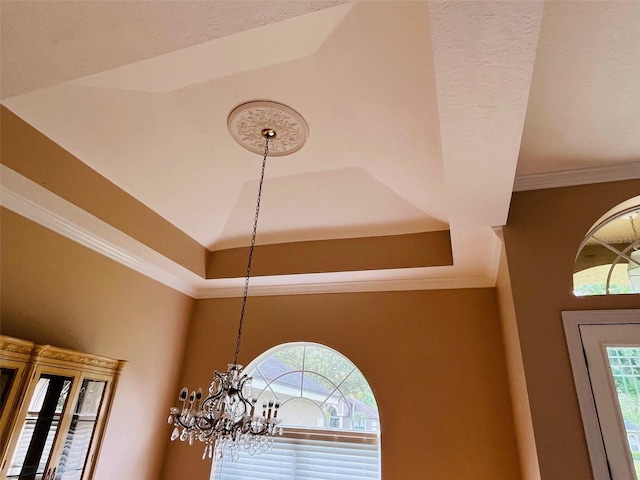 702 Palenci Ct, Winter Springs, FL 32708 - interior details featuring a notable chandelier and ornamental molding