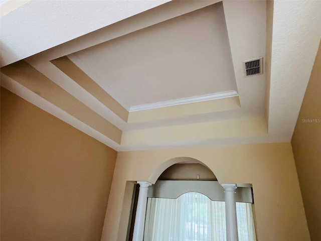 702 Palenci Ct, Winter Springs, FL 32708 - interior details featuring arched walkways, visible vents, ornate columns, and a raised ceiling