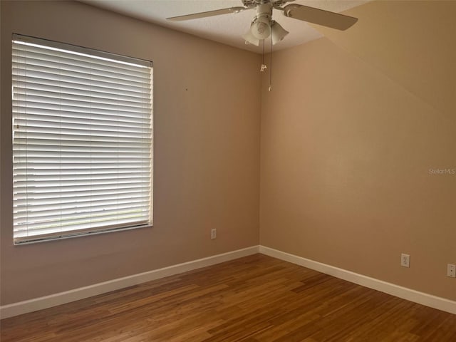702 Palenci Ct, Winter Springs, FL 32708 - unfurnished room with baseboards, a ceiling fan, and wood finished floors