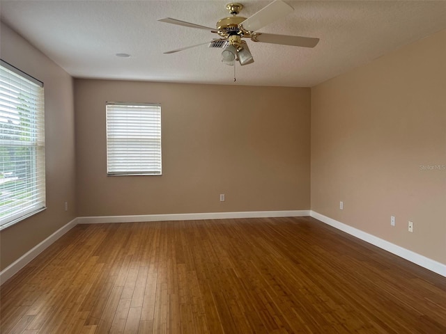 702 Palenci Ct, Winter Springs, FL 32708 - unfurnished room with wood finished floors, ceiling fan, and plenty of natural light