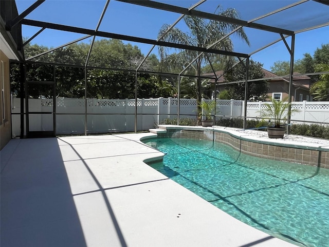 702 Palenci Ct, Winter Springs, FL 32708 - view of pool with a patio area, a fenced in pool, fence, and glass enclosure